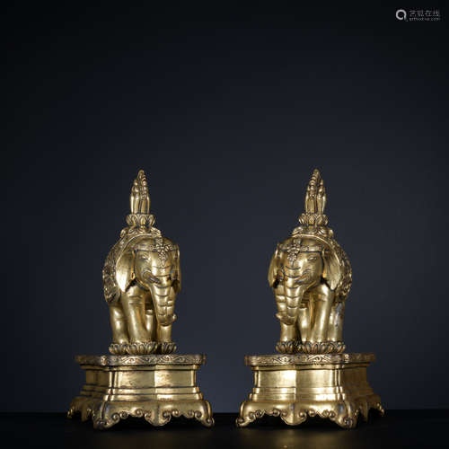 A pair of gilt-bronze elephant