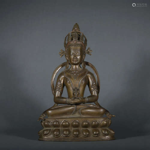 A bronze statue of Ayi Buddha