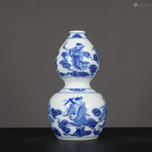 A blue and white 'figure' gourd-shaped vase