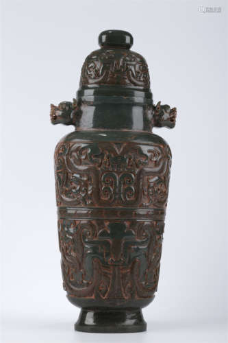 A Gray Jade Bottle with Taotie Design.