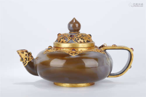 An Agate Teapot with Gold Rim.