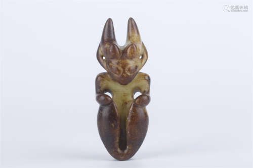 An Antique Jade Sun-God Sculpture.