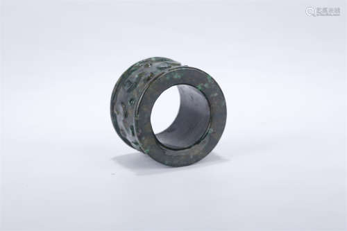 A Jadeite Thumb Ring.