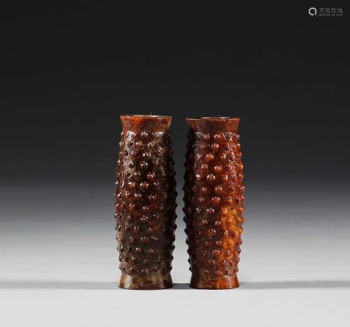 In the Han Dynasty, Hetian jade bone nail pattern Lezi was a...