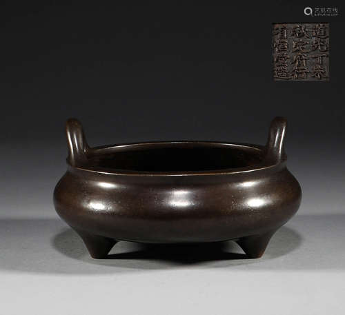 In the Qing Dynasty, the bronze three legged two ear censer