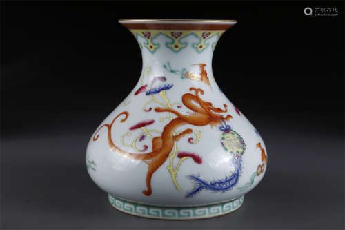 A Rose Porcelain Bottle with Dragon Design.