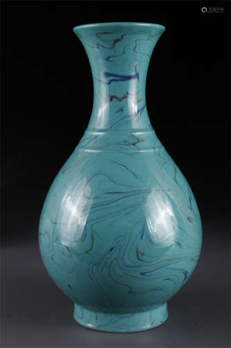 A Nerikomi Glazed Porcelain Bottle.