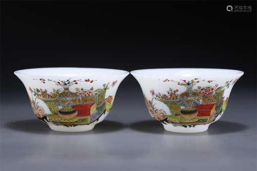 A Pair of Glass Cups with Antique Design.