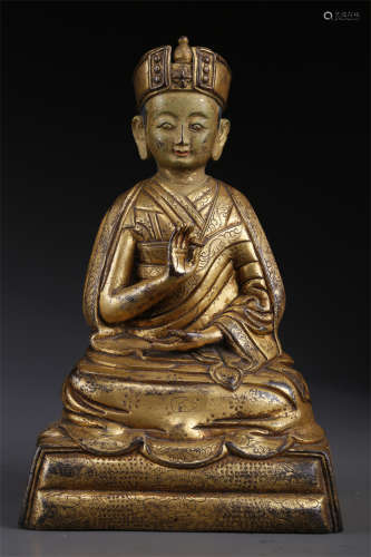 A Gilt Copper Guru Buddha Statue.
