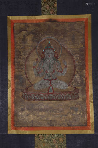 An Avalokitesvara Thangka with Pearl Inlay.