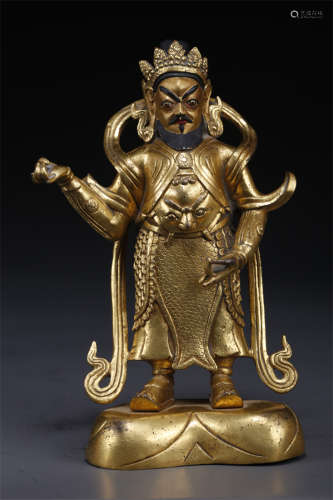 A Gilt Copper Heavenly King Statue.