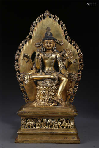 A Gilt Copper Six-Arm Avalokitesvara Statue.