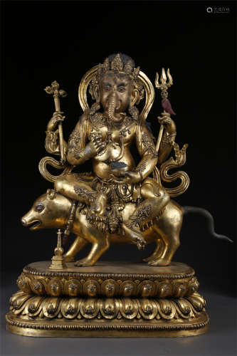 A Gilt Copper Sangharama Bodhisattva Statue.