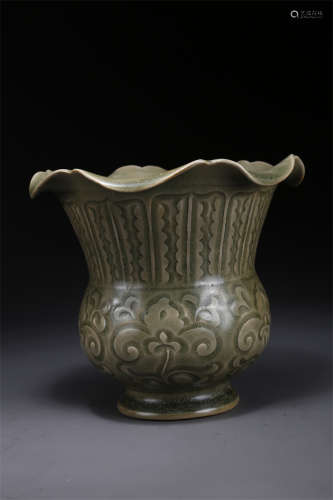 A Porcelain Jar with Flower Shaped Rim.