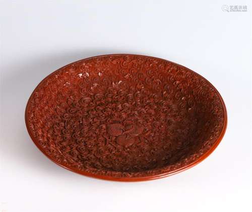 A CHINESE TIXI LACQUER PATTERN DISH