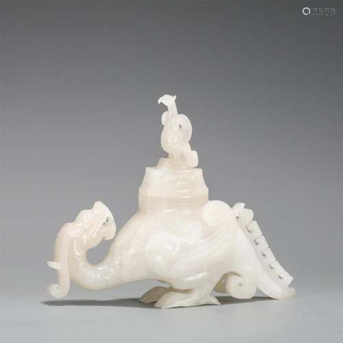 A CHINESE WHITE JADE BEAST SHAPED INCENSE CAGE