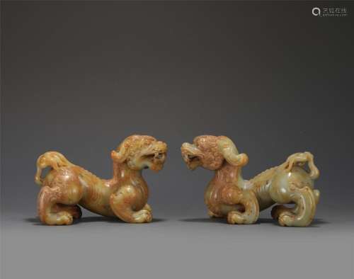 A PAIR OF CHINESE JADE BEAST DECORATIONS