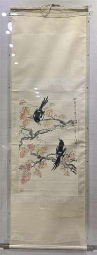 A CHINESE PAINTING OF BIRDS ON BRANCHES