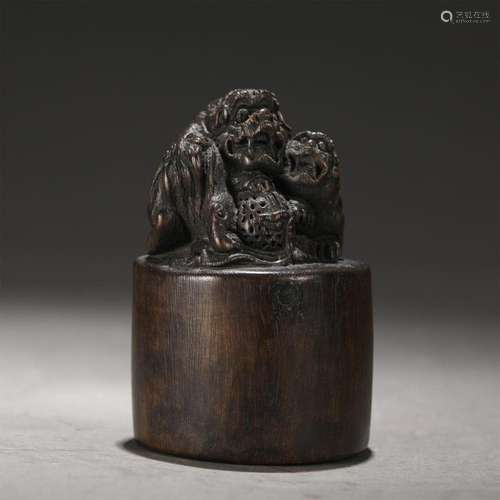 A CHINESE WOODEN LION