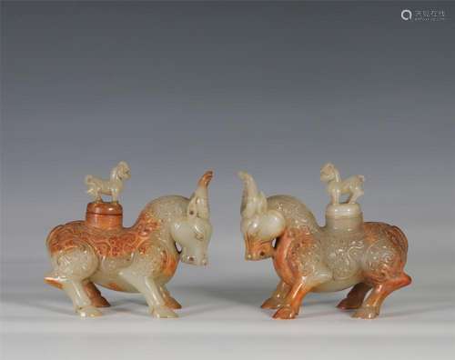 A PAIR OF CHINESE JADE BEAST DECORATIONS