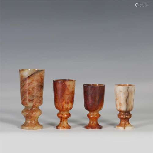 A GROUP OF CHINESE JADE CUP