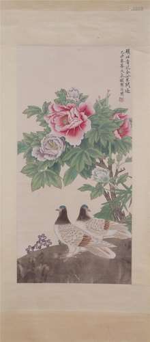 A CHINESE PAINTING OF FLOWERS AND BIRDS