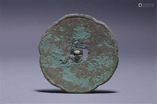 A CHINESE BRONZE MIRROR