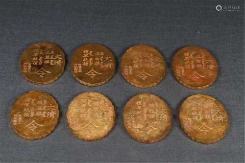 A SET OF CHINESE PALACE GILT BRONZE TOKENS