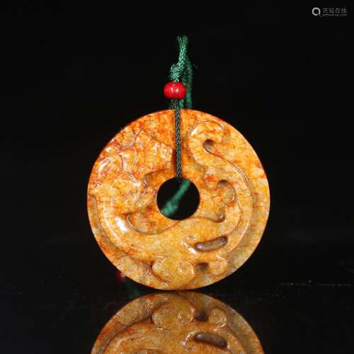 A CHINESE JADE ROUND PENDANT