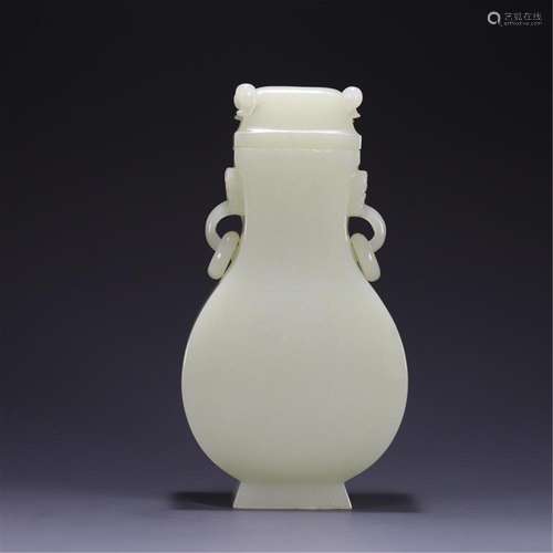 A CHINESE JADE LIDDED VASE