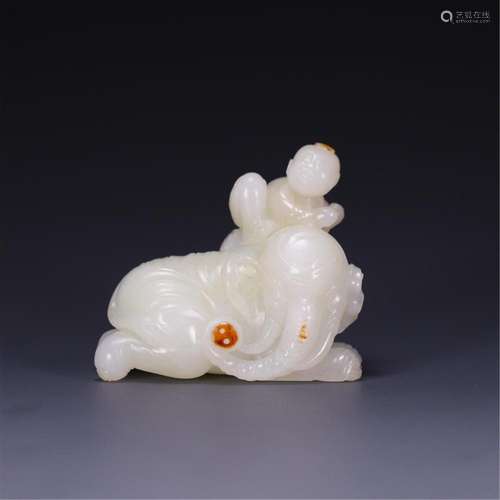 A CHINESE JADE BOY AND ELEPHANT ORNAMENTS