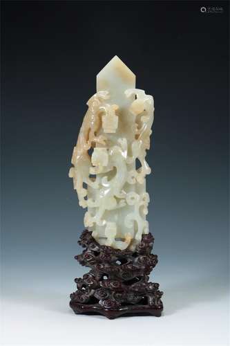 A CHINESE JADE SEED MATERIAL CARVED DRAGON DECORATIONS