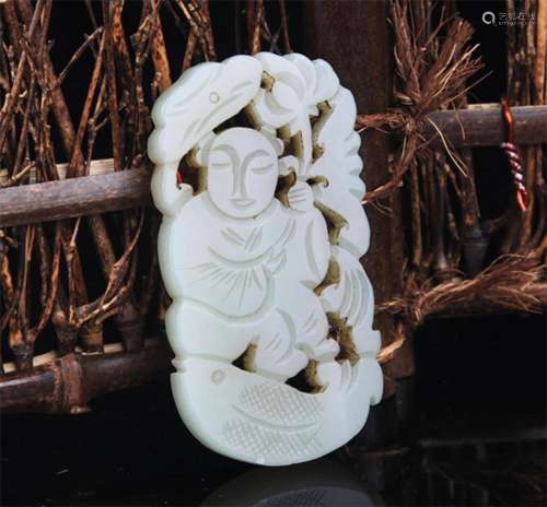 A FINE BOY WITH LOTUS CARVING PALE CELADON JADE PENDANT