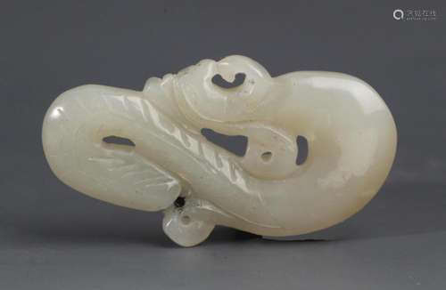 A FINE PALE CELADON JADE DRAGON FIGURE PENDANT