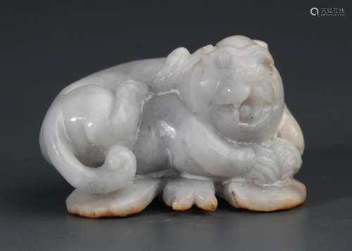 A FINE PALE CELADON JADE RUI SHOU FIGURE PENDANT