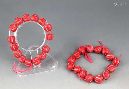 GROUP OF TWO RED GLAZE BRACELETS