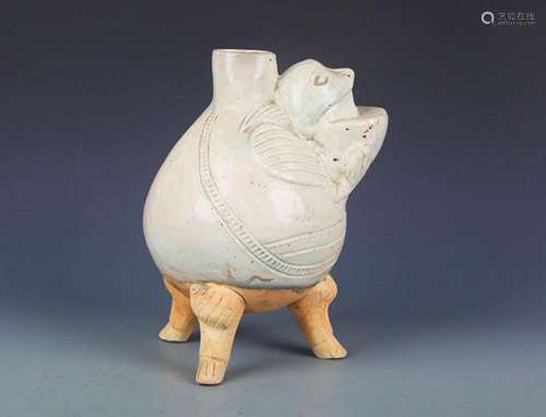 A CELADON ANIMAL HEAD THREE FEET WATER JAR