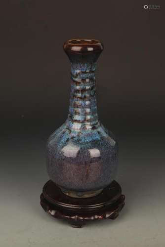 A DARK BLUE GLAZED GARLIC HEAD PORCELAIN BOTTLE