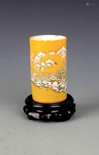 A SMALL YELLOW-GROUND PORCELAIN BRUSH HOLDER
