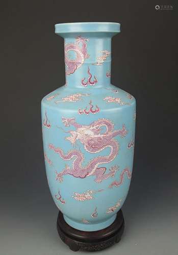 A LIGHT BLUE GROUND DRAGON PATTERN VASE