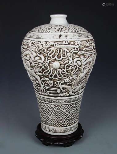 A WHITE COLOR KILN DRAGON PATTERN MEI STYLE VASE