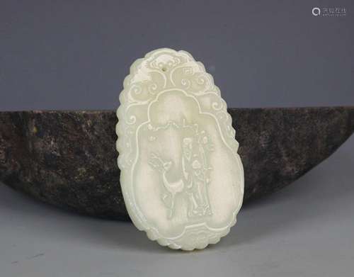 A FINELY CARVED HETIAN GREENISH WHITE JADE PENDANT