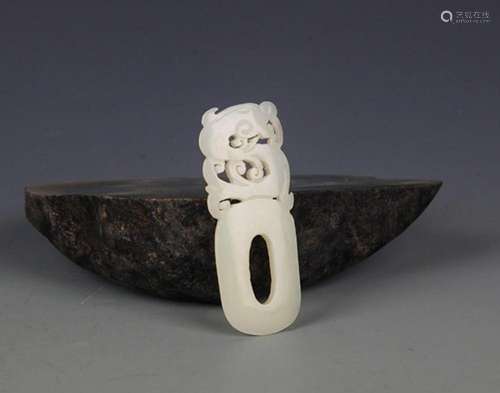 A FINE GREENISH WHITE JADE IN FIGURE OF DRAGON