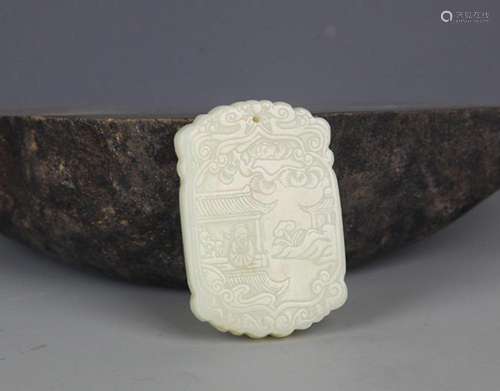 A FINELY CARVED HETIAN GREENISH WHITE JADE PENDANT