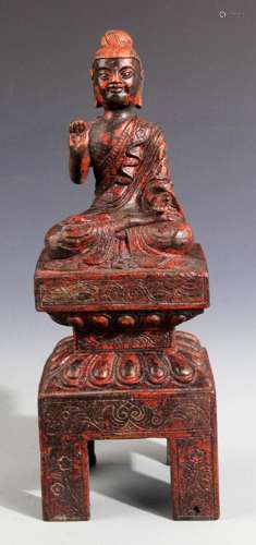 A RED COLOR PAINTED BUDDHA STATUE