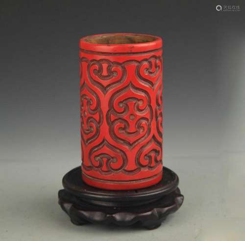 A FINE CARVED LACQUER PEH HOLDER
