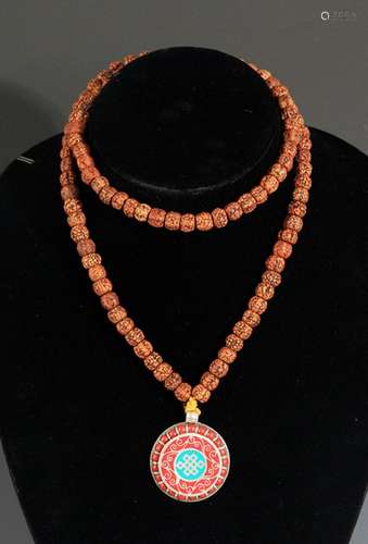 A FINE PU TI NECKLACE