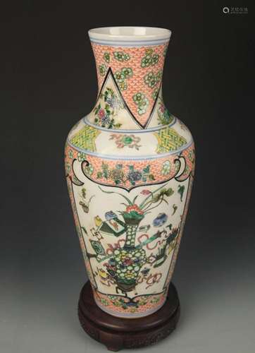 A FAMILLE VERTE FLOWER PAINTED GUAN YIN VASE