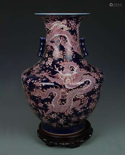 A DEEP BLUE GROUND DRAGON PATTERN PORCELAIN VASE