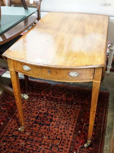 A George III banded mahogany oval topped Pembroke table, wid...